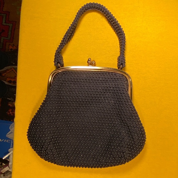Lumured Handbags - Lumured black beaded kiss lock purse.